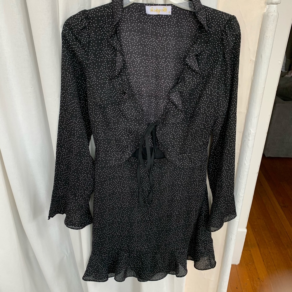 Polka dotted black dress